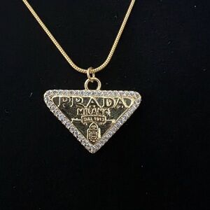 Prada Gold Tone Pendant with crystal border and unbranded chain Necklace